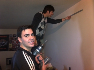 TAF staff installing IEQ equipment in suites