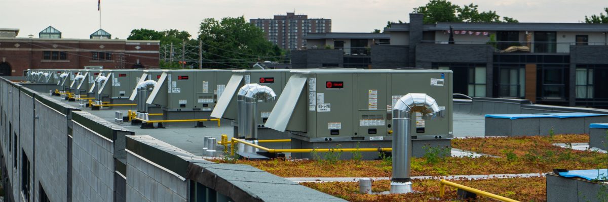 A view of the roof of a building with mechanical equipment on top