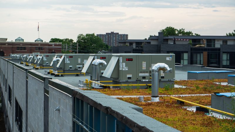 A view of the roof of a building with mechanical equipment on top